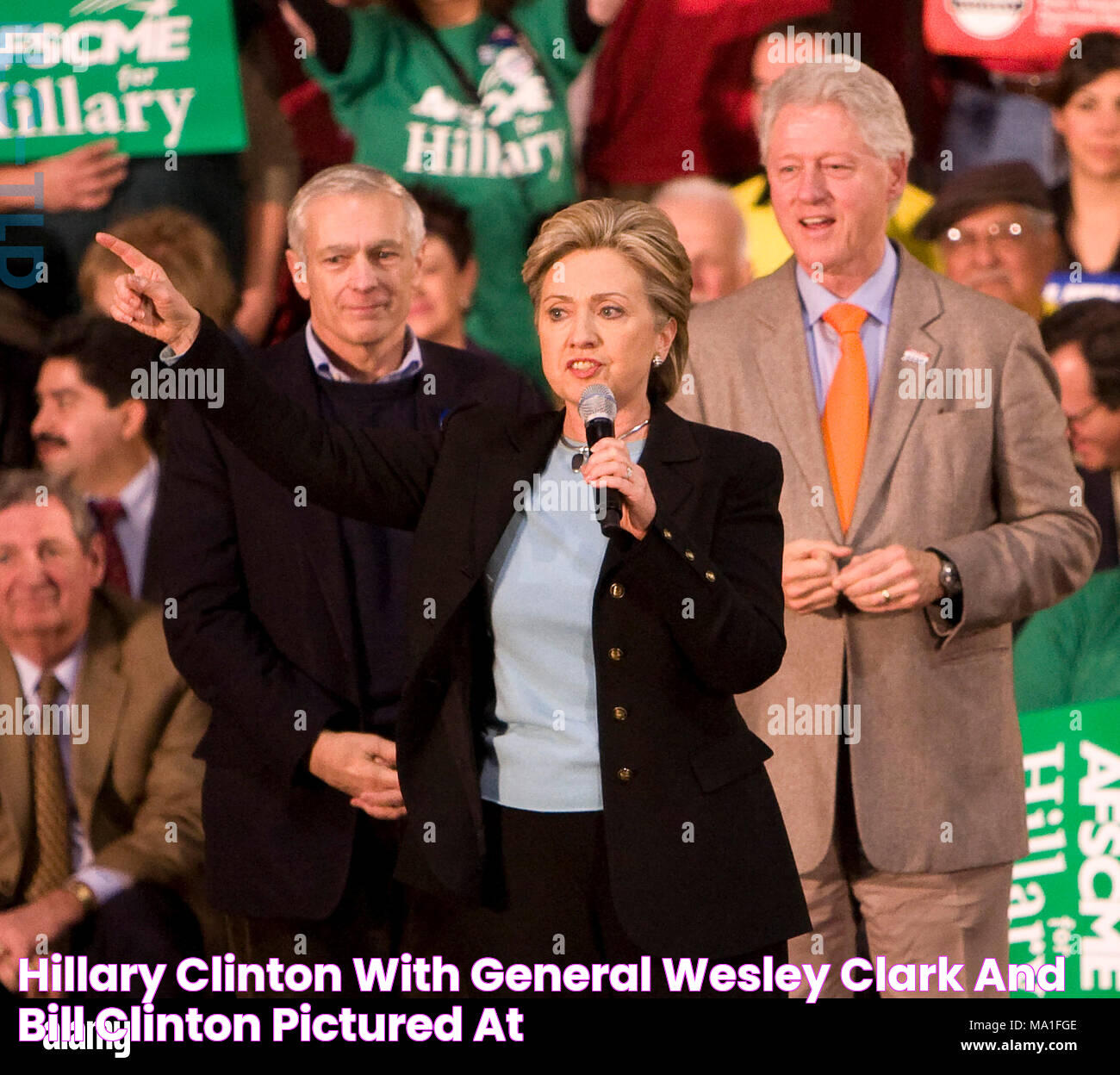 Hillary Clinton with General Wesley Clark and Bill Clinton pictured at