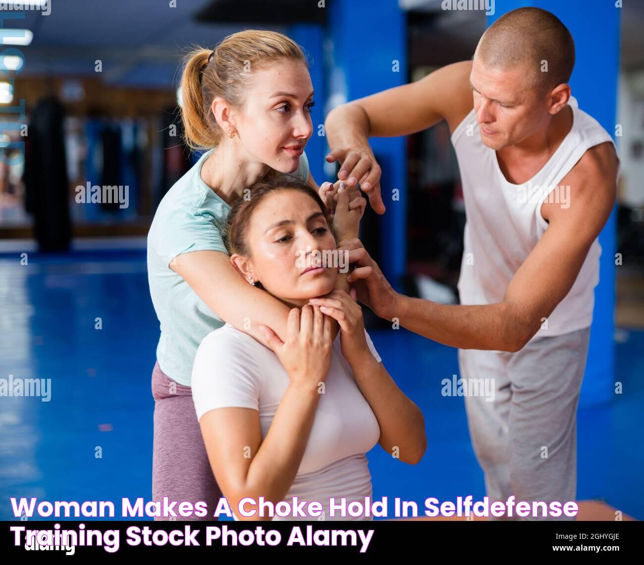 Woman makes a choke hold in selfdefense training Stock Photo Alamy