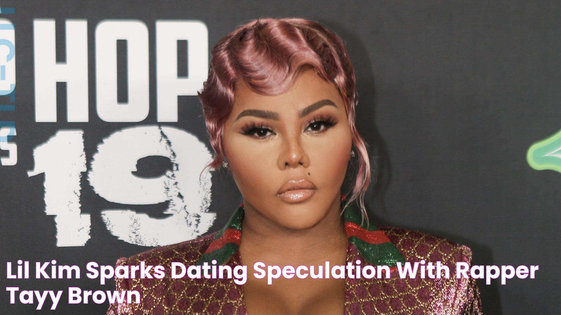 Lil' Kim Sparks Dating Speculation With Rapper Tayy Brown