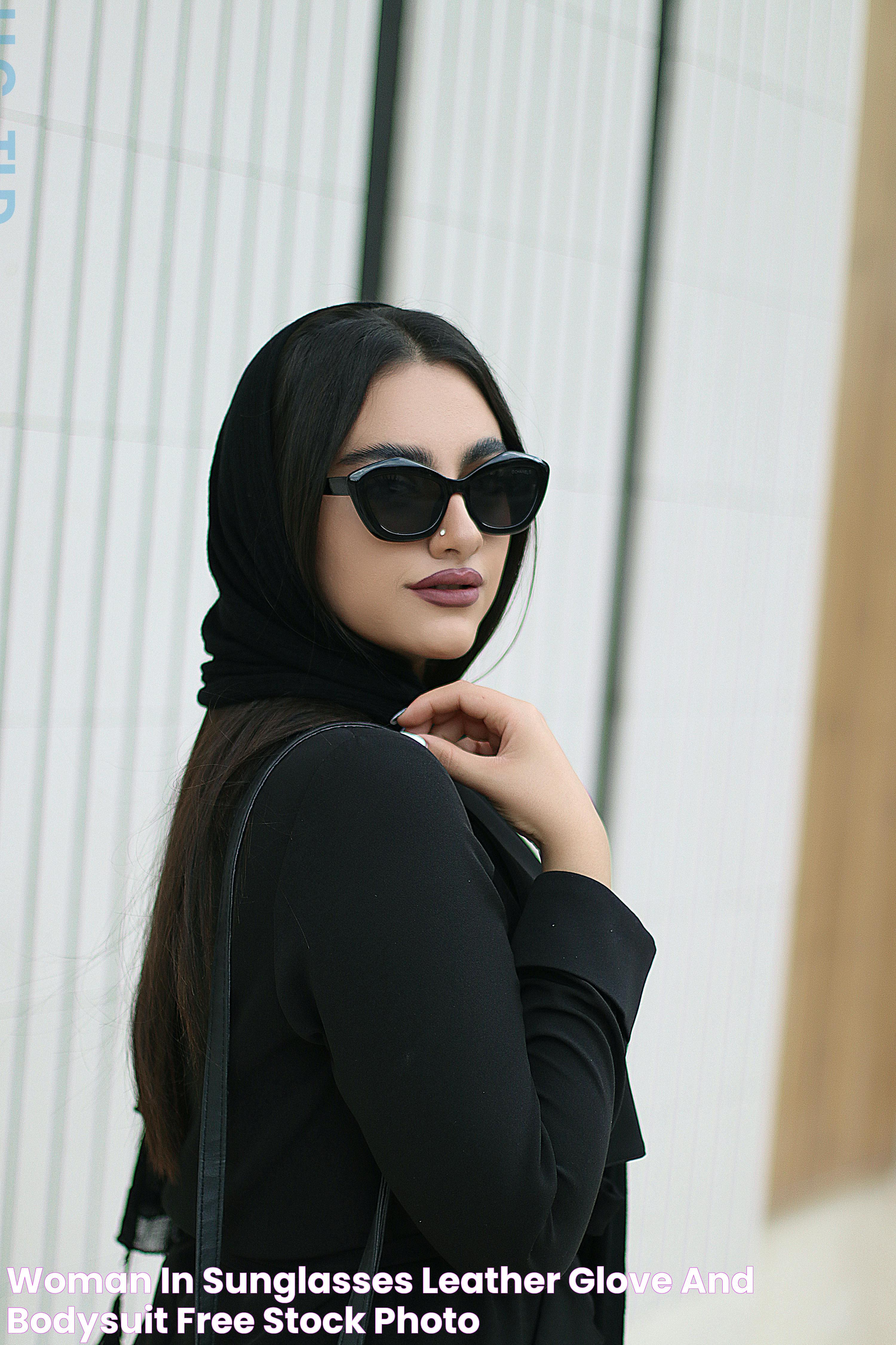 Woman in Sunglasses, Leather Glove and Bodysuit · Free Stock Photo